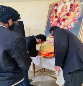 Faculty members and members of Nutriwel lighting the customary lamp before beginning the demo at IIMT university, Meerut